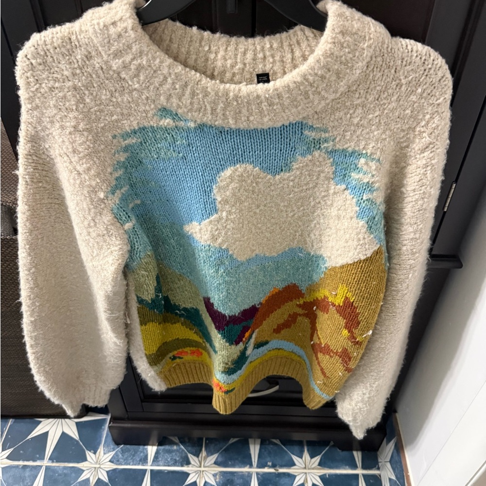Artistic Cream Sweater with Scenic Design